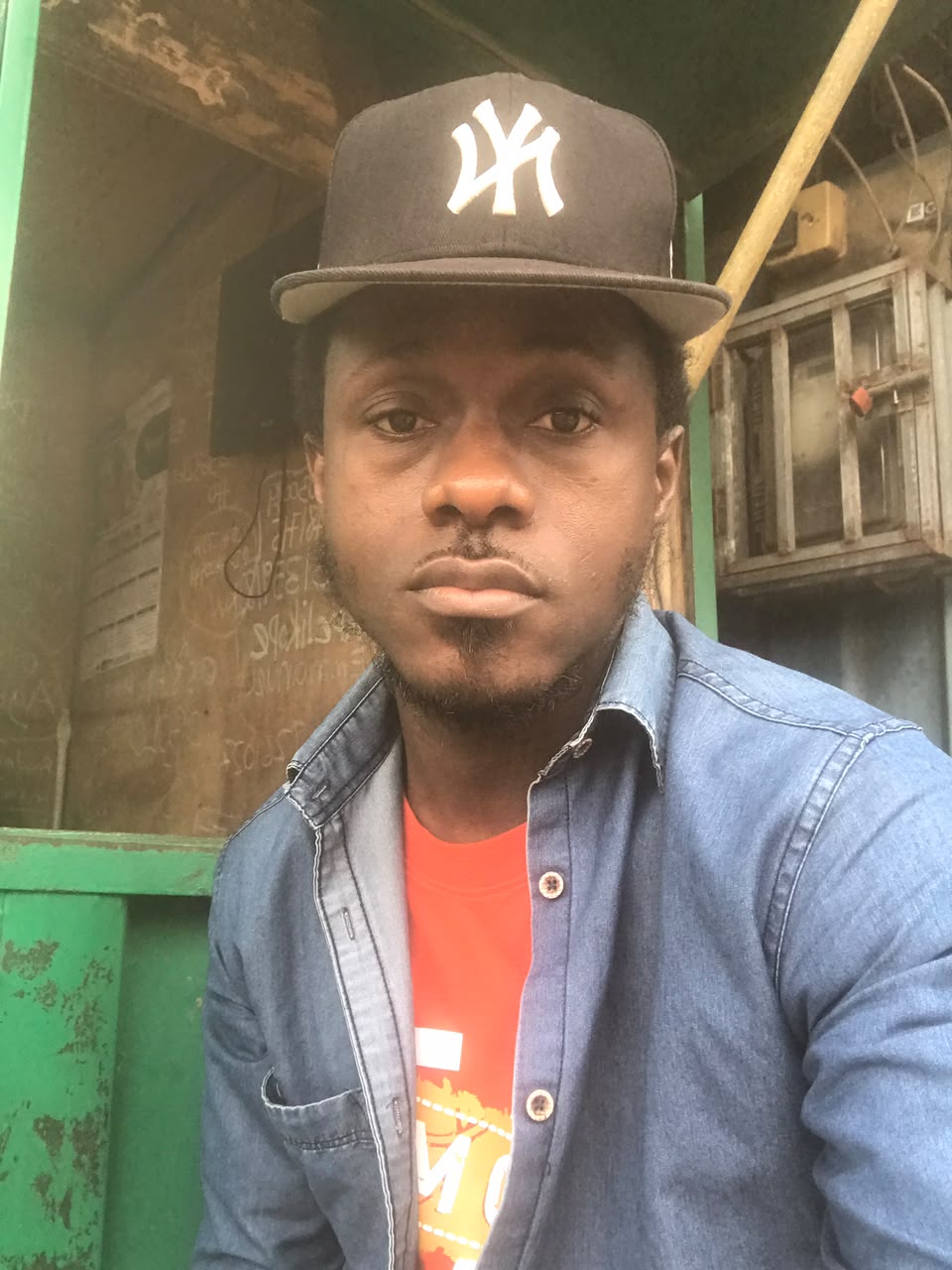 Portrait wearing a Yankees cap